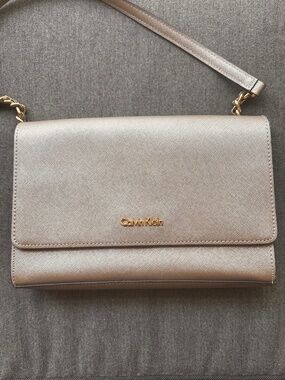 Did you say Wedding?  Gold Calvin Klein Handbag.